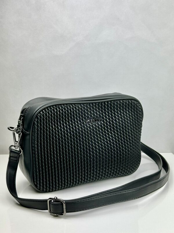 Erium | Mala Tiracolo